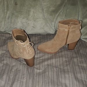 Never worn beige ankle high boots.